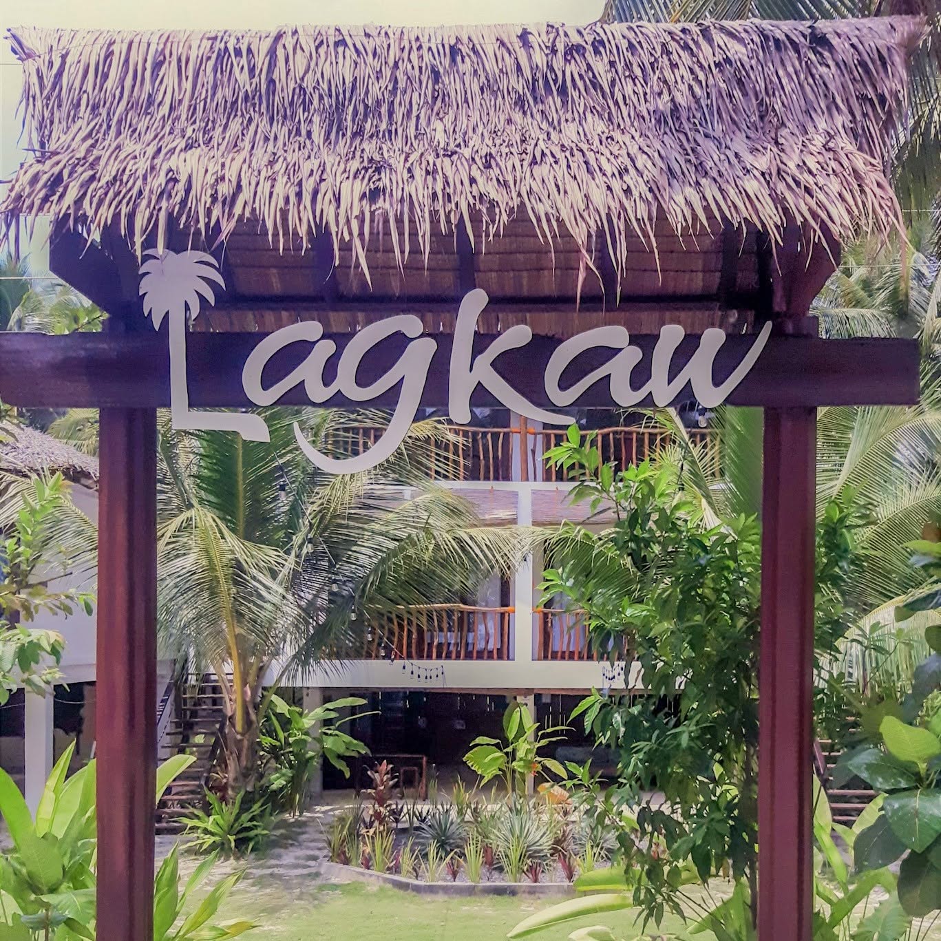 Palm trees surrounding a tropical island stay